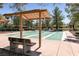Enjoy shuffleboard in the community, with multiple courts and shaded seating available for players and spectators at 9917 Arbuckle Dr, Las Vegas, NV 89134