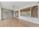 Bright sunroom featuring large windows, sliding doors, and light wood floors at 9917 Arbuckle Dr, Las Vegas, NV 89134