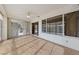 Enclosed sunroom featuring light hard wood floors and lots of windows at 9917 Arbuckle Dr, Las Vegas, NV 89134