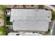 Aerial view of the home featuring a large gray roof, small backyard, and desert surroundings at 109 Reverie Heights Ave, Henderson, NV 89011