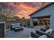 Inviting backyard patio with comfortable seating, perfect for outdoor entertaining and enjoying scenic views at 109 Reverie Heights Ave, Henderson, NV 89011