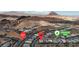 Aerial view of the community showing the neighborhood layout, mountains, and a community park at 109 Reverie Heights Ave, Henderson, NV 89011