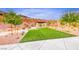 Community park with an artificial grass yard and an elegant pergola at 109 Reverie Heights Ave, Henderson, NV 89011