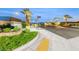 Street view of Revere community entrance with modern landscaping and well-lit street at 109 Reverie Heights Ave, Henderson, NV 89011