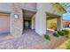 Inviting entryway with stone accents and desert landscaping leading to the front door at 109 Reverie Heights Ave, Henderson, NV 89011
