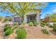 Beautiful single-story home with desert-friendly landscaping and a stone accent at 109 Reverie Heights Ave, Henderson, NV 89011