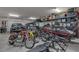 Spacious garage with motorcycles, a jeep, ATV, and lots of storage at 109 Reverie Heights Ave, Henderson, NV 89011