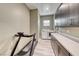Laundry room with sleek cabinets, countertop, and washer/dryer at 109 Reverie Heights Ave, Henderson, NV 89011