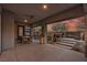 Outdoor patio with dining area, fireplace, and desert views at 109 Reverie Heights Ave, Henderson, NV 89011