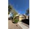 Lovely two-story home featuring desert landscaping, a two car garage, and a sunny blue sky at 1205 Padre Serra Ln, Las Vegas, NV 89134