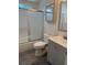Compact bathroom featuring a shower-tub combo and modern sink at 1305 Shenandoah St, Boulder City, NV 89005