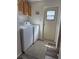 Practical laundry room equipped with a washer and dryer at 1305 Shenandoah St, Boulder City, NV 89005