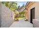 This backyard boasts an outdoor shower, putting green, and access to the house at 15 Vintage Canyon St, Las Vegas, NV 89141