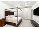Bedroom with a four poster bed and a modern style at 15 Vintage Canyon St, Las Vegas, NV 89141