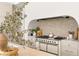 Bright kitchen featuring high-end appliances, and a neutral color palette at 15 Vintage Canyon St, Las Vegas, NV 89141
