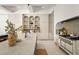 Elegant kitchen featuring custom cabinetry, a large island, and high-end appliances at 15 Vintage Canyon St, Las Vegas, NV 89141