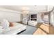 Open main bedroom with an outdoor patio through sliding glass doors, a TV, and two chairs at 15 Vintage Canyon St, Las Vegas, NV 89141