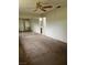Large bedroom featuring neutral carpet and mirrored closet at 158 Greenbriar Townhouse Way, Las Vegas, NV 89121