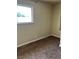 Bedroom with neutral colored walls, carpet flooring, and natural light at 158 Greenbriar Townhouse Way, Las Vegas, NV 89121