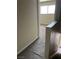 Carpeted hallway view leading towards a naturally lit room at 158 Greenbriar Townhouse Way, Las Vegas, NV 89121