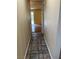 Hallway view with tile floors leading to the living room at 158 Greenbriar Townhouse Way, Las Vegas, NV 89121
