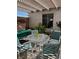 Cozy patio with a pergola, outdoor seating, and pleasant sunlight at 158 Greenbriar Townhouse Way, Las Vegas, NV 89121