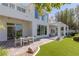 Spacious backyard with artificial turf and a paved patio, ideal for entertaining guests outdoors at 1613 Iron Ridge Dr, Las Vegas, NV 89117