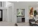 Entertainment area featuring stylish bar area with wine fridge, elegant backsplash and decorative art at 1613 Iron Ridge Dr, Las Vegas, NV 89117