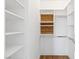 Well-organized walk-in closet with custom shelving and ample storage space at 1613 Iron Ridge Dr, Las Vegas, NV 89117