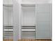 A closet featuring a modern sliding door design and custom shelving offers storage at 1613 Iron Ridge Dr, Las Vegas, NV 89117