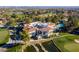 Aerial view of community clubhouse boasting refined architecture with golf course, and mature landscaping in a picturesque setting at 1613 Iron Ridge Dr, Las Vegas, NV 89117