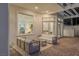Covered patio with stylish outdoor seating, perfect for relaxation and entertaining guests at 1613 Iron Ridge Dr, Las Vegas, NV 89117