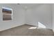 Neutral bedroom with plush carpet and a bright window at 164 Cabo Cruces Dr, Henderson, NV 89011