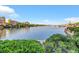 Expansive lake view with waterfront buildings and lush green vegetation at 164 Cabo Cruces Dr, Henderson, NV 89011