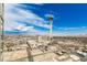 Stunning aerial view shows the city skyline and the Stratosphere Hotel under clear blue skies at 200 W Sahara Ave # 2407, Las Vegas, NV 89102
