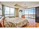 Spacious bedroom with floor-to-ceiling windows showcasing city views at 200 W Sahara Ave # 2407, Las Vegas, NV 89102