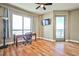 Comfortable bedroom featuring hardwood floors, fan and balcony access with panoramic views at 200 W Sahara Ave # 2407, Las Vegas, NV 89102