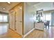 Hallway with closet and shelving unit, leading to view of cityscape outside of window at 200 W Sahara Ave # 2407, Las Vegas, NV 89102