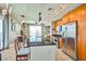 Kitchen features granite counters, stainless steel appliances, tile backsplash, and breakfast bar seating at 200 W Sahara Ave # 2407, Las Vegas, NV 89102