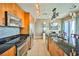 Modern kitchen showcasing granite counters, stainless appliances, and a large island for entertaining at 200 W Sahara Ave # 2407, Las Vegas, NV 89102