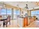 Bright, modern kitchen area with stainless steel appliances, breakfast bar, and scenic views at 200 W Sahara Ave # 2407, Las Vegas, NV 89102