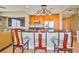 Kitchen with granite countertops, stainless steel appliances, tile backsplash, and wood cabinets at 200 W Sahara Ave # 2407, Las Vegas, NV 89102