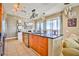 Gourmet kitchen featuring granite counters, stainless steel appliances, and island with breakfast bar at 200 W Sahara Ave # 2407, Las Vegas, NV 89102