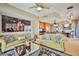 Elegant living room boasts hardwood floors, stylish furnishings, and an open layout to the gourmet kitchen at 200 W Sahara Ave # 2407, Las Vegas, NV 89102