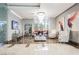 Bright lobby area with modern decor, a chandelier, artwork, and comfortable seating at 200 W Sahara Ave # 2407, Las Vegas, NV 89102