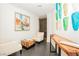 Inviting lobby with comfortable seating, unique artwork, and a modern accent wall at 200 W Sahara Ave # 2407, Las Vegas, NV 89102