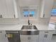 Kitchen sink and counterspace showing stainless appliances and sleek hardware at 2201 W Wisteria Way, Pahrump, NV 89048