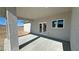 Covered patio with double doors, recessed lighting, and desert surroundings at 2201 W Wisteria Way, Pahrump, NV 89048
