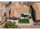 Aerial view of a well-maintained backyard, patio, and lush green space at 2317 Sierra Heights Dr, Las Vegas, NV 89134