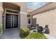 Beautiful covered entryway features a double door and an outdoor seating area at 2317 Sierra Heights Dr, Las Vegas, NV 89134